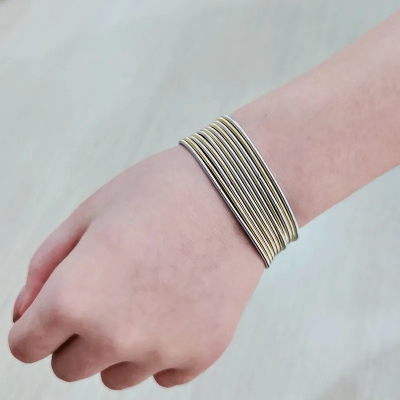 17km fashion jewelry Timeless Quick-Wear japanese fashion jewelry Waterproof Stainless Steel Guitar String Bracelet for Men & Women isola 54- fashion jewelry rapallo foto