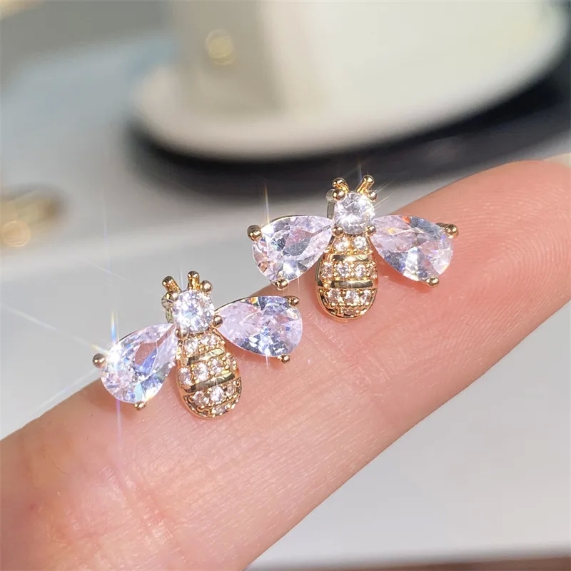 fine jewelry gold bracelets Boho Chic Zircon Bee Studs: Gold-Plated Copper Earrings with Organic fine jewelry 18k Elegance oro italia fine jewelry