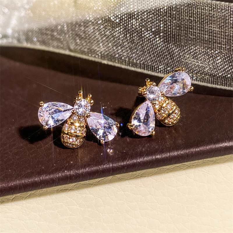 lucy's fine jewelry Boho Chic Zircon Bee Studs: Gold-Plated Copper Earrings with fine jewelry evil eye Organic Elegance fine jewelry buyers near me