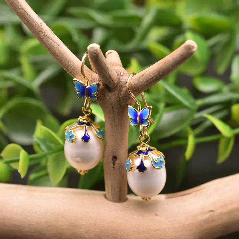 custom high end jewelry "Upcycled Artsy high end jewelry engagement rings Copper Drop Earrings: Sleek Butterfly & Pearl Design with Playful Cloud Motif" insurance for high end jewelry