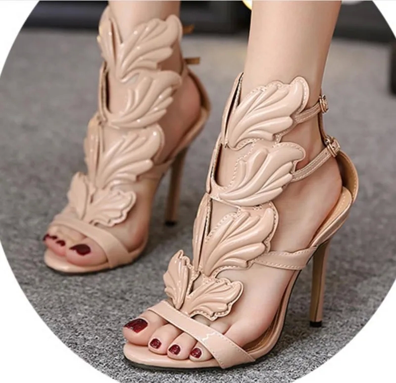 affordable luxe "Exclusive Glossy Waterproof Stiletto artsy Sandals – Handpicked Fashion-Forward Metal Wing Heels" boho chic