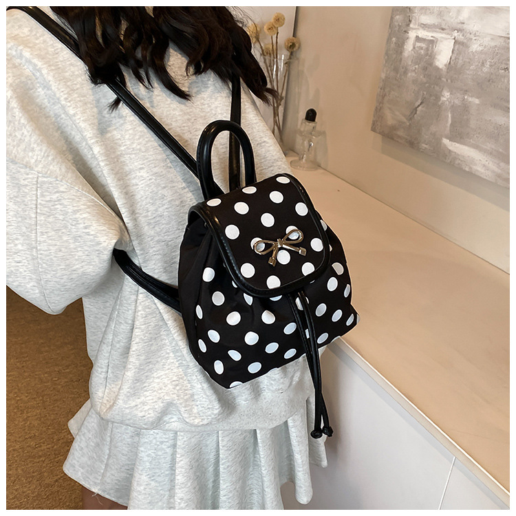 bags core keeper Vintage Polka Dot Bow Backpack: Classic Elegance for School, Shopping & Daily Use – Women's bags by monty Refined Style bags packed gif