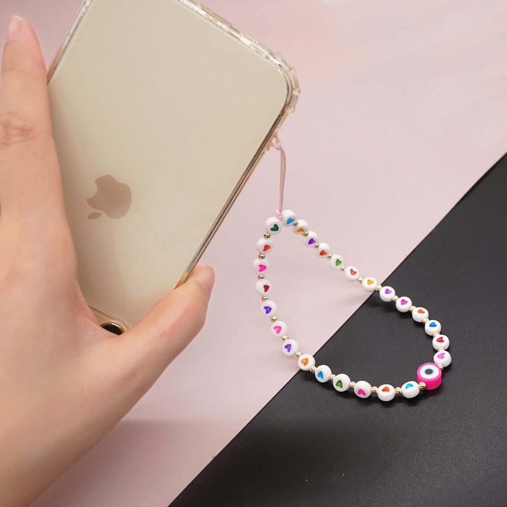 fashion accessories logo Sparkling Minimalist Acrylic Heart Devil's Eye Phone fashion accessories brand name ideas Chain - Bold, Comfortable Wrist Pendant for Mobile Phones fashion accessories quarter 2