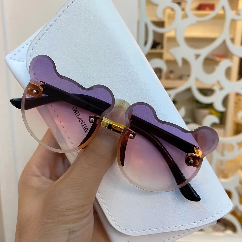 affordable luxury pieces "Affordable grunge Korean Cat Eye Kids Sunglasses – Boho Chic Frameless Style for Everyday Wear" shiny