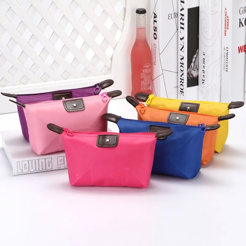 health & beauty-x foto's Retro High-Fashion Hand-Engraved Nylon Dumpling Cosmetic Bag – Seasonal Solid Color Cloud Zipper natural beauty & health Design share price beauty health